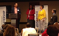 Everett Housing Authority accepts the 2014 Excellence in Housing Award from Nan McKay and John McKay.