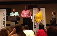 The Housing Authority of Lancaster accepts the 2014 NMA Pioneer in Housing Award from Nan McKay and John McKay.