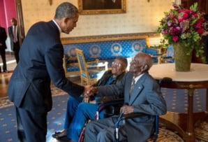 President Barack Obama greets 107-year-old Army veteran Richard Overton, with Earlene Love-Karo, at the White House, Nov. 11, 2013. Overton and his guest attended the Veteran's Day Breakfast at the White House.