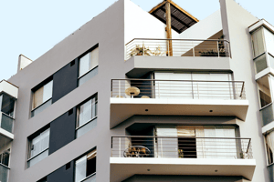 White apartment building with balconies